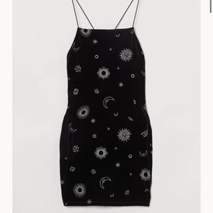 Black velvet mini dress with silver details.